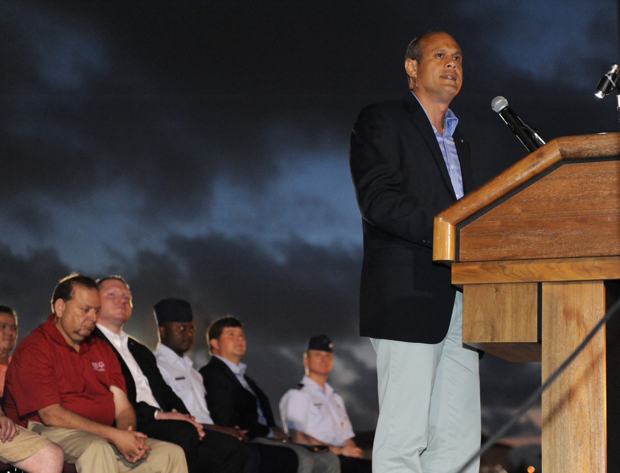 Anthony Bahou, Special Olympics Mississippi Summer Games CEO, delivers remarks during the SOMS opening ceremonies at the triangle area May 20, 2016, Keesler Air Force Base, Miss. This is the 30th year Keesler has hosted the state Special Olympics.  (U.S. Air Force photo by Kemberly Groue)