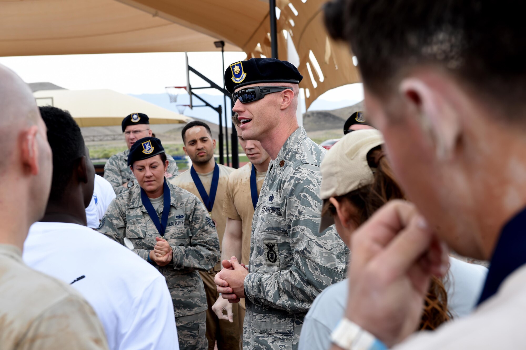 Maj. Michael 799th Security Forces Squadron commander explains the importance of National Police Week May 20, 2016 at Creech Air Force Base, Nevada. National Police Week takes place annually to honor the service and sacrifice of civilian and military law enforcement members. (U.S. Air Force photo by Senior Airman Adarius Petty /Released)