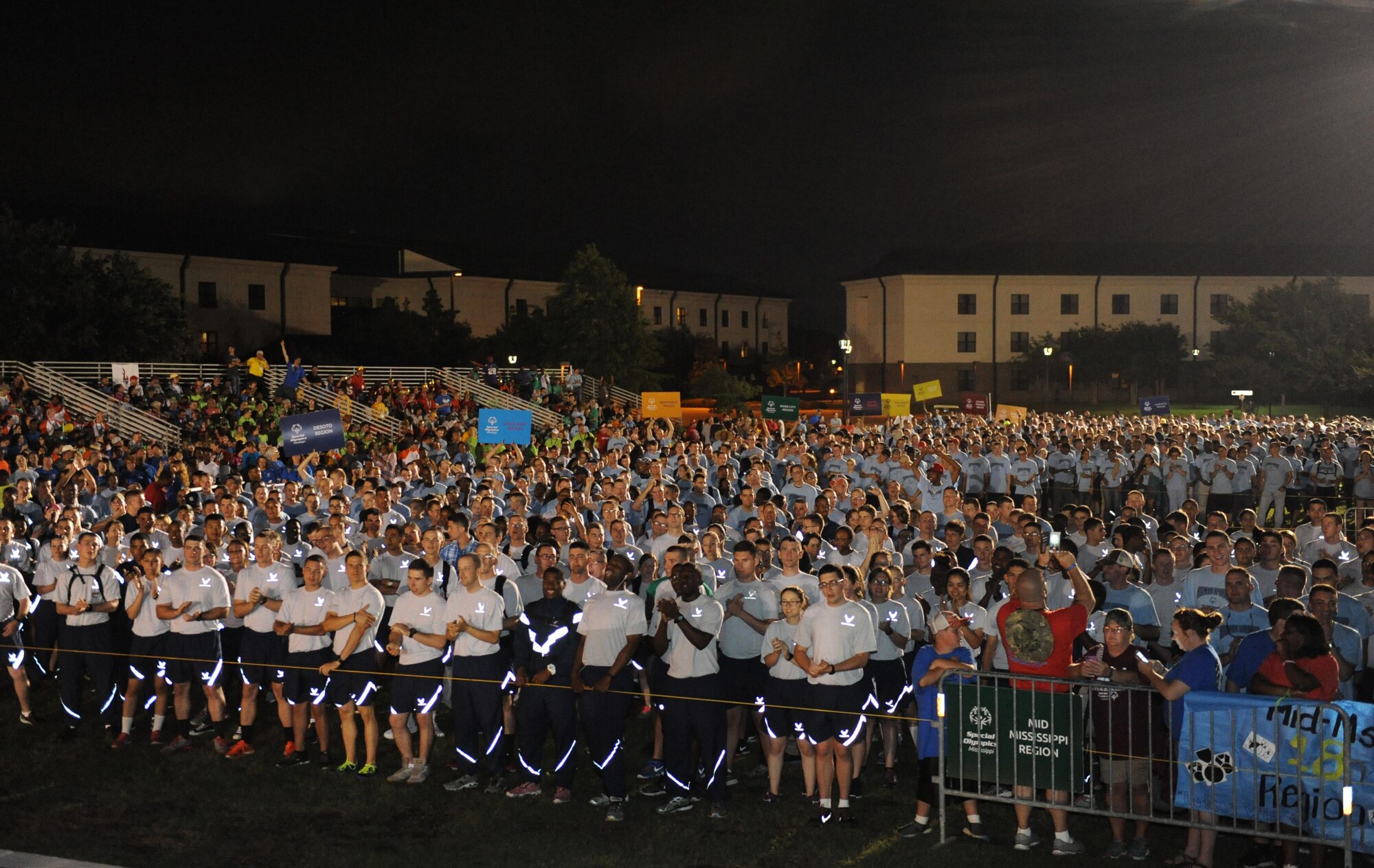 Airmen sponsors and athletes attend the Special Olympics Mississippi Summer Games opening ceremonies at the triangle area May 20, 2016, Keesler Air Force Base, Miss. This is the 30th year Keesler has hosted the state Special Olympics.  (U.S. Air Force photo by Kemberly Groue)