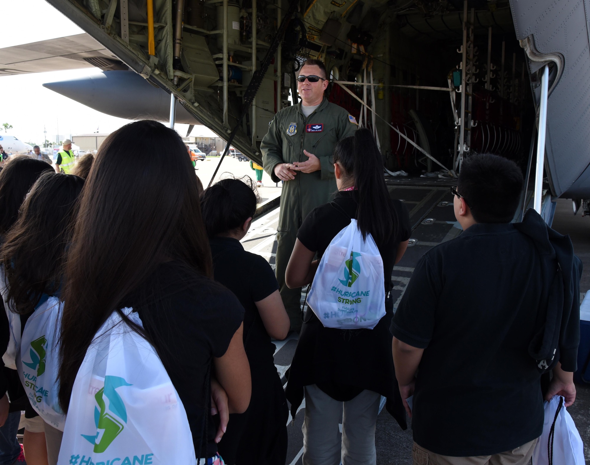 Senior Master Sgt. Jay Latham, 53rd Weather Reconnaissance Squadron dropsonde operator, briefs students during the Gulf Coast Hurricane Awareness Tour May 16-20, 2016. The Air Force Reserve Hurricane Hunter aircrew with their WC-130J Super Hercules, based out of Keesler Air Force Base, Mississippi, and a team of National Oceanic and Atmospheric Administration hurricane experts visited five Gulf Coast cities as part of this year’s tour. (U.S. Air Force photo/Maj. Marnee A.C. Losurdo)