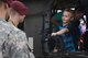 A child asks U.S. Army soldiers questions about the UH-60 Black Hawk helicopter during the 2016 Shaw Air Expo and open house, “Thunder Over the Midlands,” at Shaw Air Force Base, S.C., May 21. The Black Hawk was one of many static equipment displays with which air expo attendees were able
to interact. (U.S. Air Force photo by Senior Airman Zade Vadnais)
