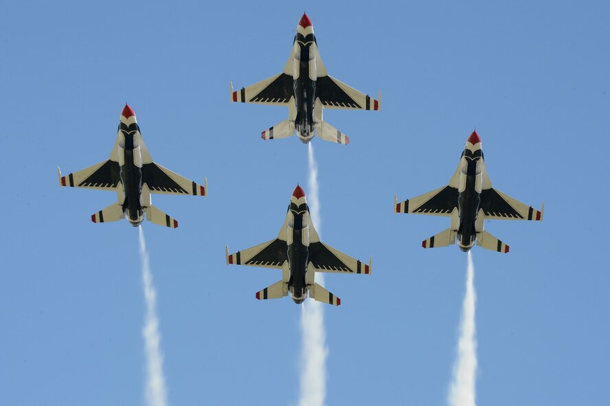 Members of the U.S. Air Force Air Demonstration Squadron fly over the flightline during the 2016 Shaw Air Expo and open house, “Thunder Over the Midlands,” at Shaw Air Force Base, S.C., May 21. The Thunderbirds are the USAF’s precision-flying demonstration team charged with showcasing the pride, precision and professionalism of American Airmen, both in the air and on the ground, in addition to the multi-role capabilities of the Air Force’s front-line fighter jets. (U.S. Air Force photo by Senior Airman Zade Vadnais)
