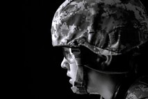 Airman Mia Rus, 4th Security Forces Squadron defender, prepares to clear a room in an Urban Tactical Training Area building during a shoot competition, May 17, 2016, at Seymour Johnson Air Force Base, North Carolina. The competition was held to honor lost defenders during Police Week. (U.S. Air Force photo by Airman Shawna L. Keyes/Released)