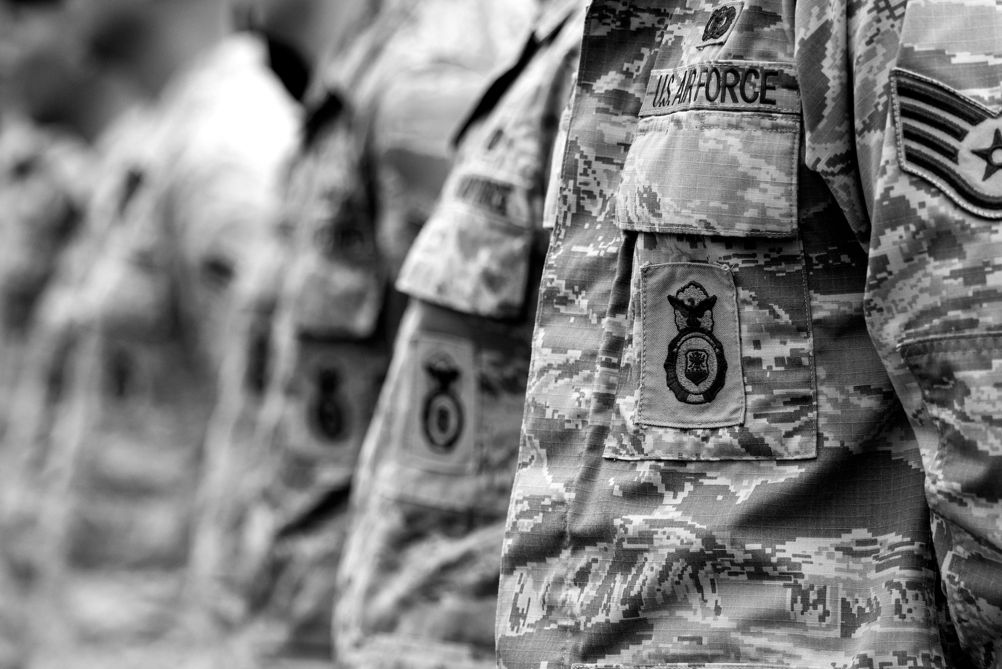 Airmen from the 4th Security Forces Squadron stand in formation for the Police Week closing ceremony, May 20, 2016, at Seymour Johnson Air Force Base, North Carolina. During the closing ceremony, fallen 4th SFS and Detachment 216 Air Force Office of Special Investigations Airmen were remembered, followed by a moment of silence. (U.S. Air Force photo by Airman Shawna L. Keyes/Released)