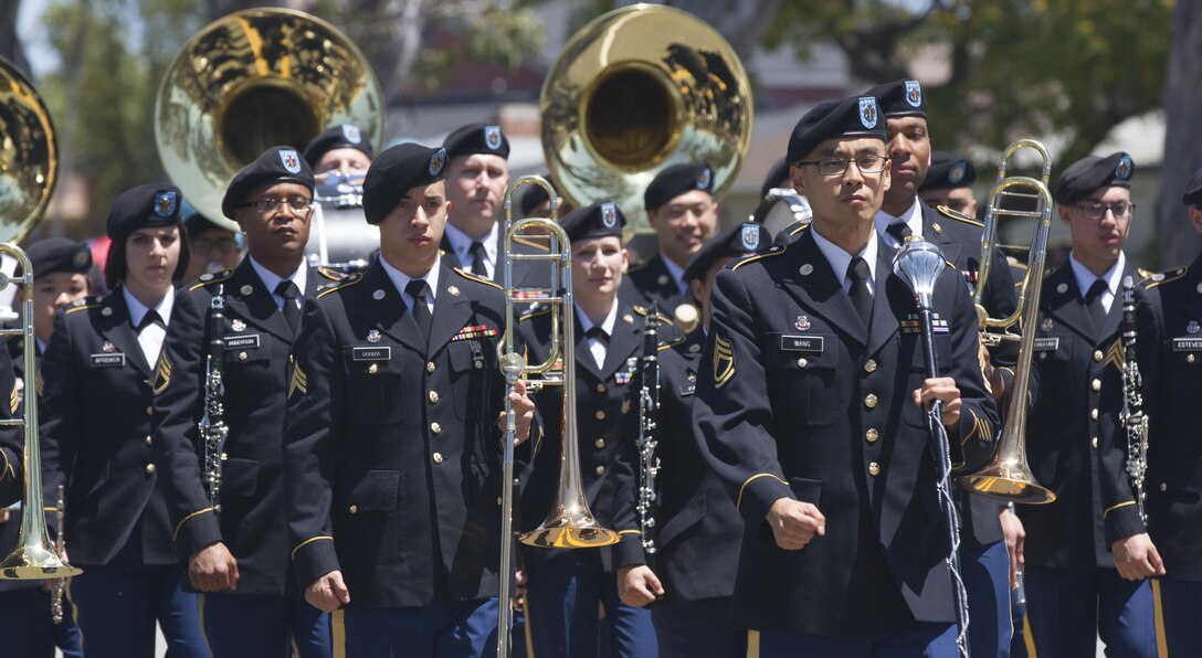 The 300th Army Band from Bell, Calif., marches down Torrance Boulevard in Torrance, Calif., May 21, 2016, during the Torrance Armed Forces Day Parade. The parade is longest running of its kind; 2016 marking its 57th year. The band is a 40-member instrumental ensamble and Southern California's only Army Reserve band. (U.S. Army Photo by Sgt. Thomas X. Crough, 201st Press Camp Headquarters).