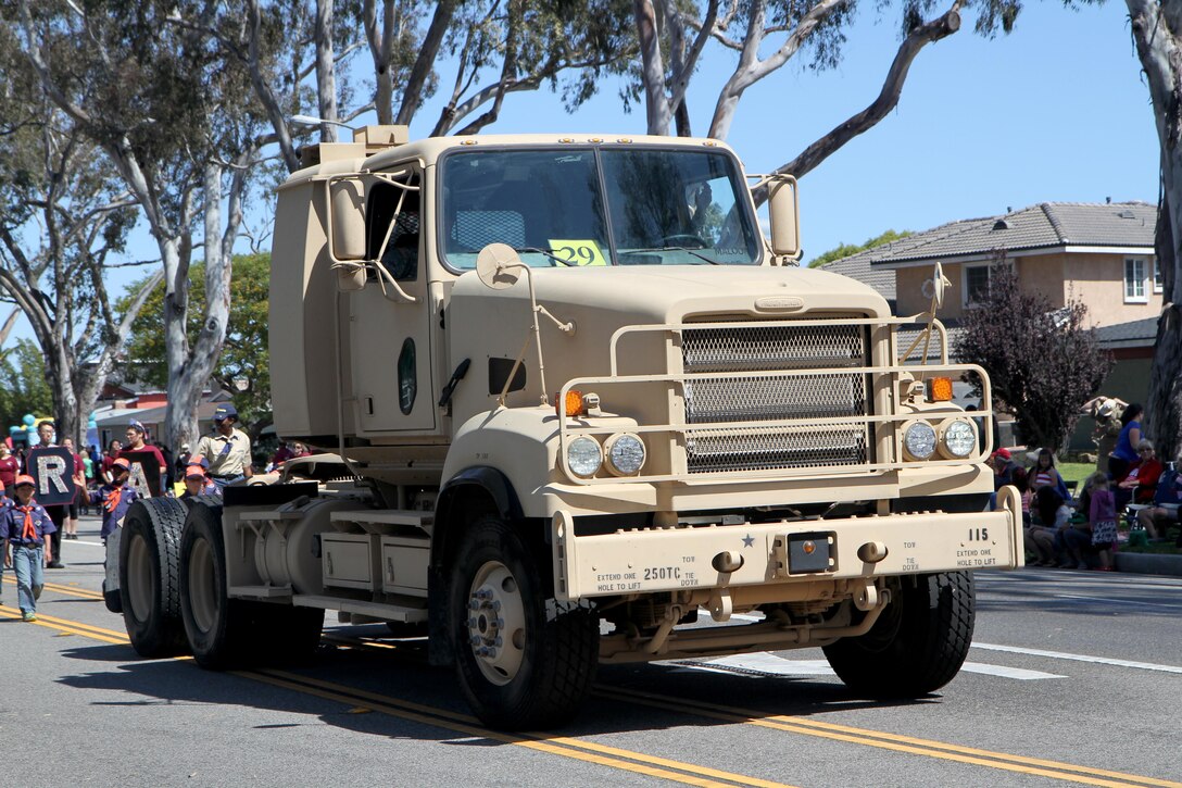 A M915A5 6X4 line-haul tractor truck from the 311th Expeditionary Sustainment Command in Los Angeles, Calif., drives down Torrance Boulevard in Torrance, Calif., May 21, 2016, during the Torrance Armed Forces Day Parade. The parade is longest running of its kind; 2016 marking its 57th year. The truck is designed to meet the battlefield requirements of the Army in Afghanistan and Iraq. (U.S. Army Photo by Sgt. Thomas X. Crough, 201st Press Camp Headquarters).