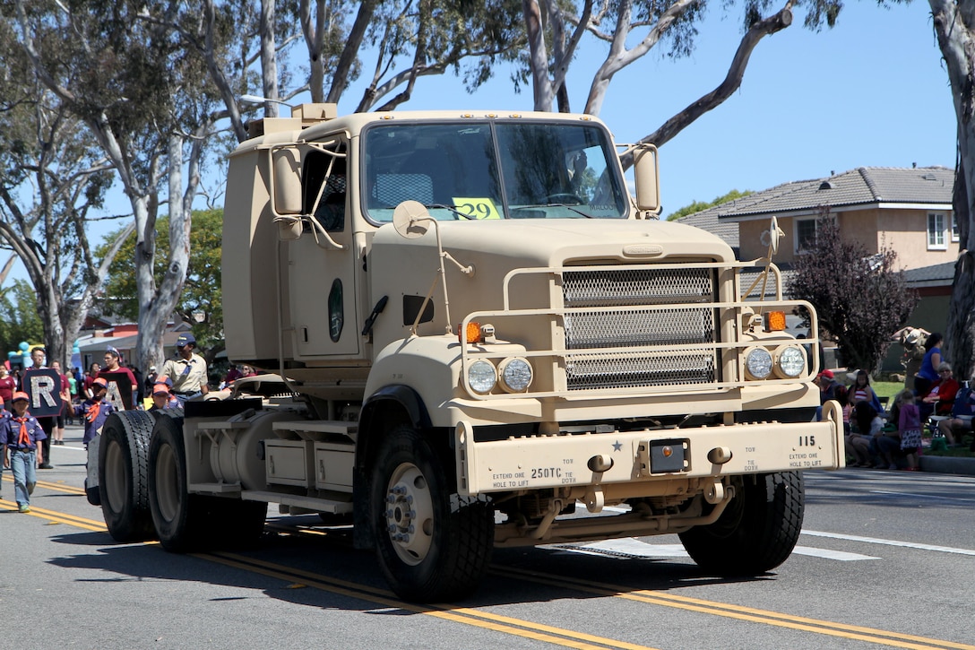 A M915A5 6X4 line-haul tractor truck from the 311th Expeditionary Sustainment Command in Los Angeles, Calif., drives down Torrance Boulevard in Torrance, Calif., May 21, 2016, during the Torrance Armed Forces Day Parade. The parade is longest running of its kind; 2016 marking its 57th year. The truck is designed to meet the battlefield requirements of the Army in Afghanistan and Iraq. (U.S. Army Photo by Sgt. Thomas X. Crough, 201st Press Camp Headquarters).