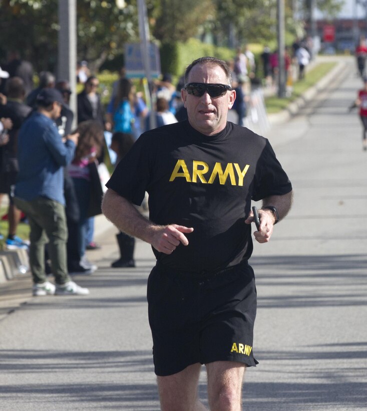 General Robert B. "Abe" Abrams Commander, U.S. Army Forces Command races to the finish line at the Armed Forces Day 5K Run/Walk, Torrance, Calif. May 21st 2016 during the 57th Annual Torrance Armed Forces Day Celebration. This is the first year the 5K is part of the celebration and is planned to reoccur every year. General Abrams was the Grand Marshal of the 57th Annual Armed Forces Day Parade. (U.S. Army Photo by Sgt. Thomas X. Crough, 201st Press Camp Headquarters).