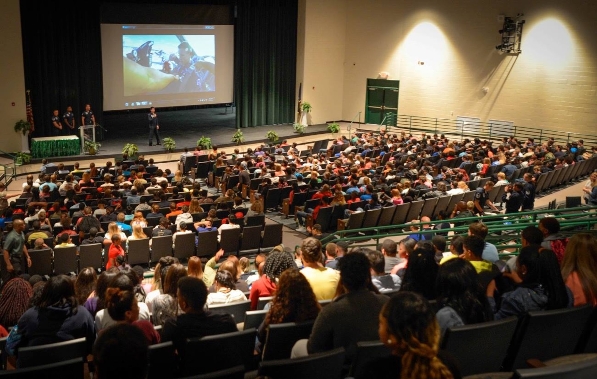 Students listen to members of the U.S. Air Force Demonstration Squadron during a school visit at Lakewood High School, Sumter, S.C., May 20, 2016. The Thunderbirds school visits are intended to help reinforce the public’s confidence in the Air Force and project international goodwill. (U.S. Air Force photo by Senior Airman Jensen Stidham)