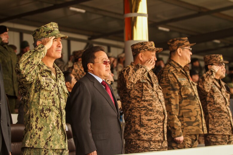 Multinational participants salute distinguished visitors and the president of Mongolia Tsakhiagiin Elbegdorj, during the opening ceremony of Khaan Quest 2016. Khaan Quest 2016 is an annual multinational peacekeeping operations exercise conducted in Mongolia and is the capstone exercise for the Global Peace Operations Initiative. 