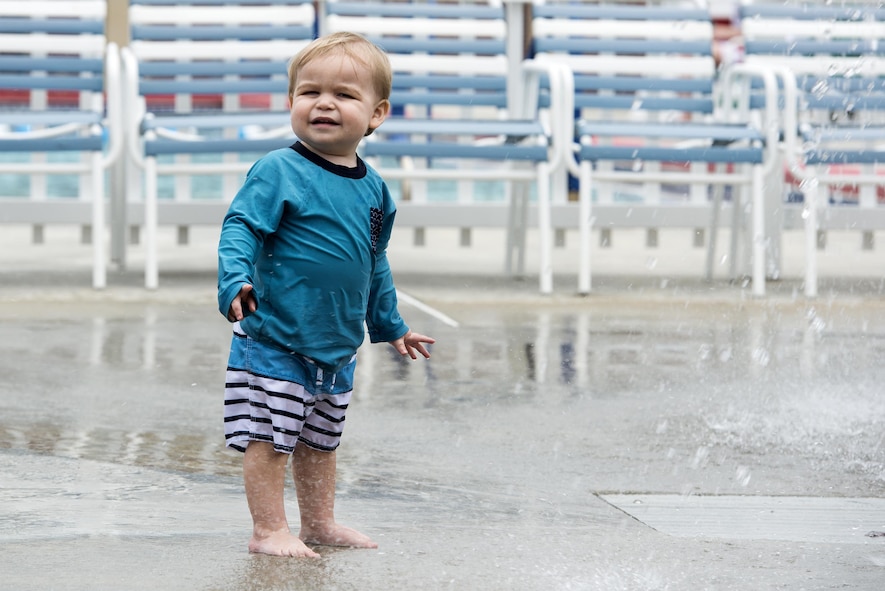 Nolan Cary, son of U.S. Air Force Capt. Scott Cary, 23d Medical Operations Squadron, gets his feet wet during the “School’s Out Splash Party,” May 20, 2016, at Moody Air Force Base, Ga. The free pool party gave anyone with base access the opportunity to check out and enjoy the facility. (U.S. Air Force Photo by Airman 1st Class Janiqua P. Robinson/Released)