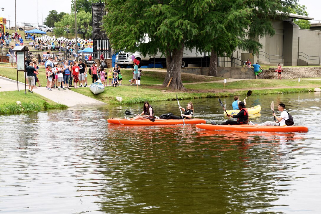 Goodfellow Air Force Base members kayak the Concho River during Goodfellow Appreciation Day at the RiverStage in San Angelo, Texas, May 21, 2016. This is the first year the Chamber of Commerce hosted Goodfellow Appreciation Day at the RiverStage. The San Angelo Chamber of Commerce hosts the event every year on Armed Forces Day to celebrate local service members. (U.S. Air Force photo by Senior Airman Joshua Edwards/Released)