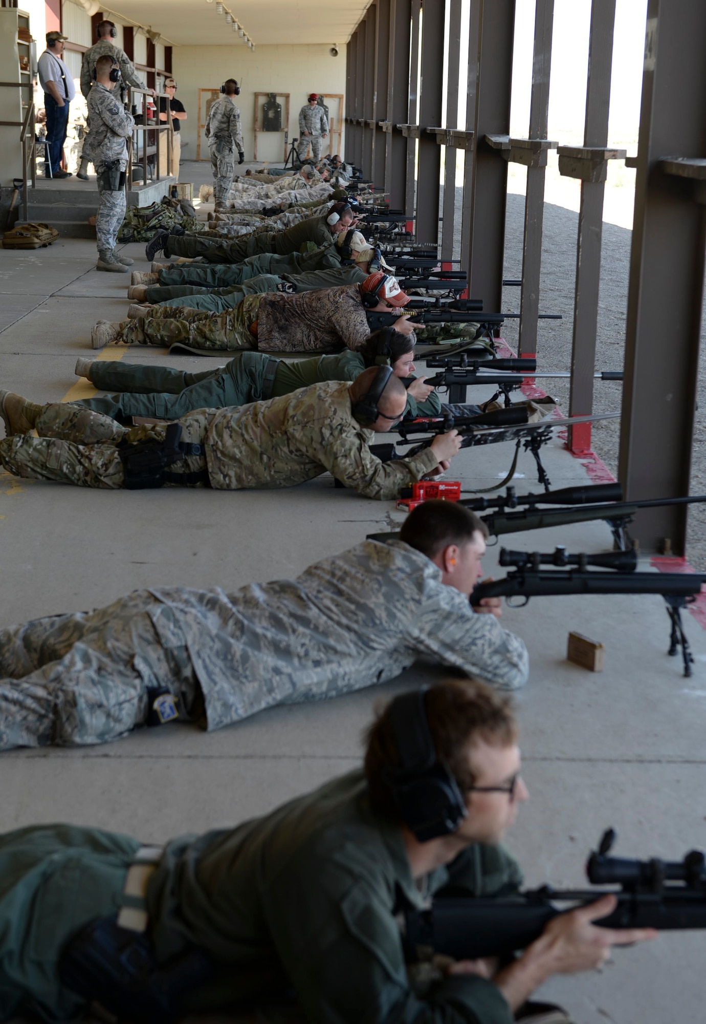 Local law enforcement officials fire at targets during a joint training exercise April 20, 2016, at Mountain Home Air Force Base, Idaho. 20 police officers from around the state of Idaho took part in the event. (U.S. Air Force photo by Airman 1st Class Chester Mientkiewicz/Released)