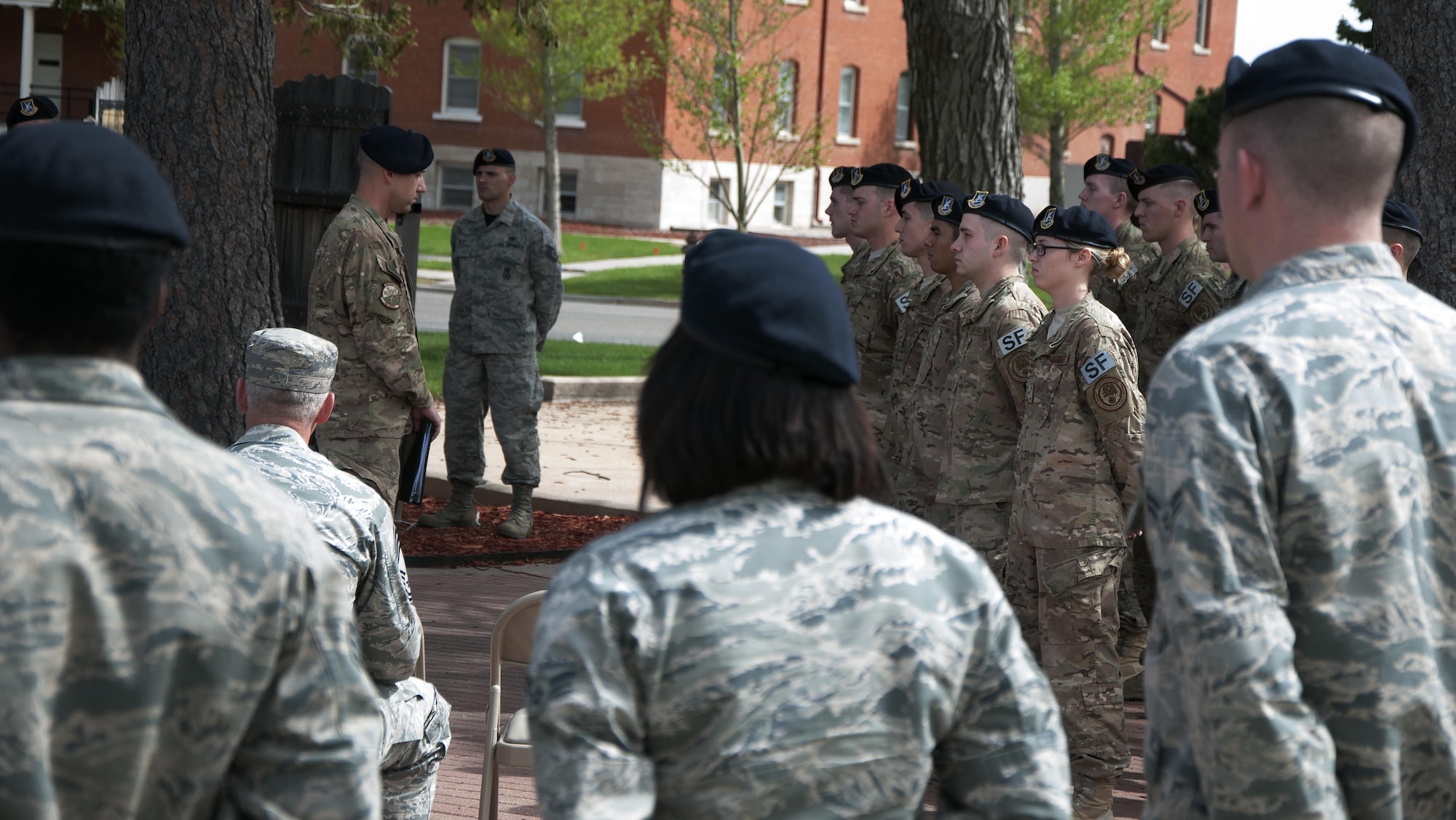 Security Forces Airmen perform a final guard mount ceremony on F.E. Warren Air Force Base, Wyo., May 20, 2016, in remembrance of the defenders who lost their lives over the past year. As each name was read, a brief biography was given about each defender and how they passed away while serving. (U.S. Air Force photo by Senior Airman Brandon Valle)