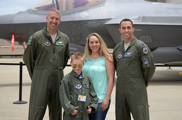 Pilot for a Day, Christian “the Natural” Loafman (center), stands in front on an F-35A Lightning II with his mother, Kerri Loafman, Lt. Col. Bradley Turner, 33rd Operations Support Squadron commander (left), and Lt. Col. Brad Bashore, 58th Fighter Squadron commander (right), at Eglin Air Force Base, Fla., May 18, 2016. After spending a day in the life of an F-35A pilot, Christian earned his call sign “the Natural” from his pilot comrades, referencing his natural ability to fly. (U.S. Air Force photo/Lena Lopez)