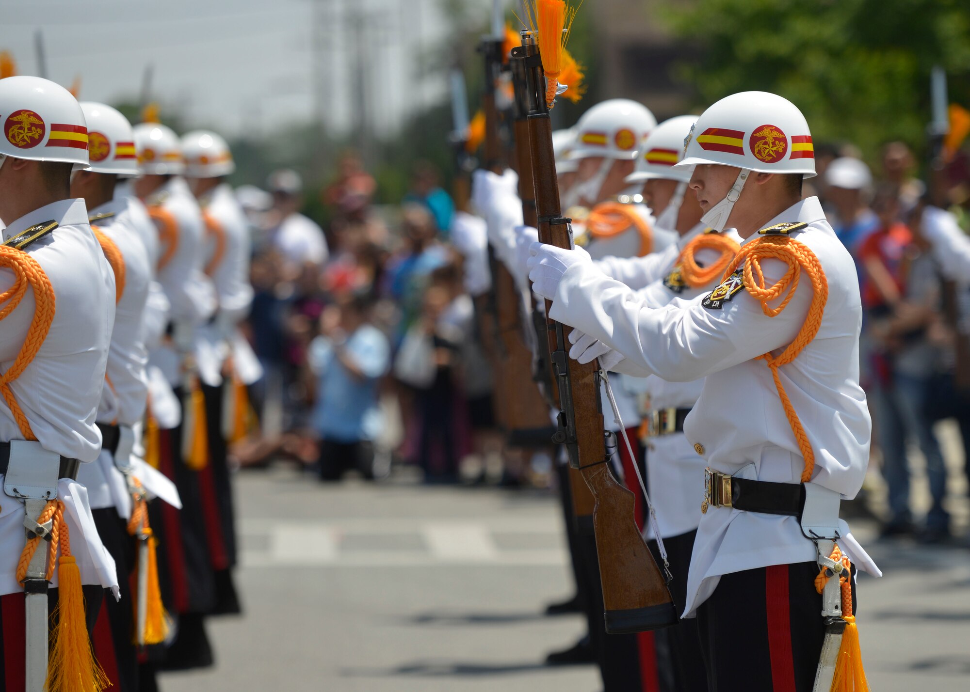 Members of the Republic of Korea marine corps drill team perform a demonstration during the Armed Forces Day Parade at Osan Air Base, Republic of Korea, May 21, 2016. The drill team was the final group in the parade and held their demonstration as the grand finale. (U.S. Air Force photo by Senior Airman Victor J. Caputo/Released)