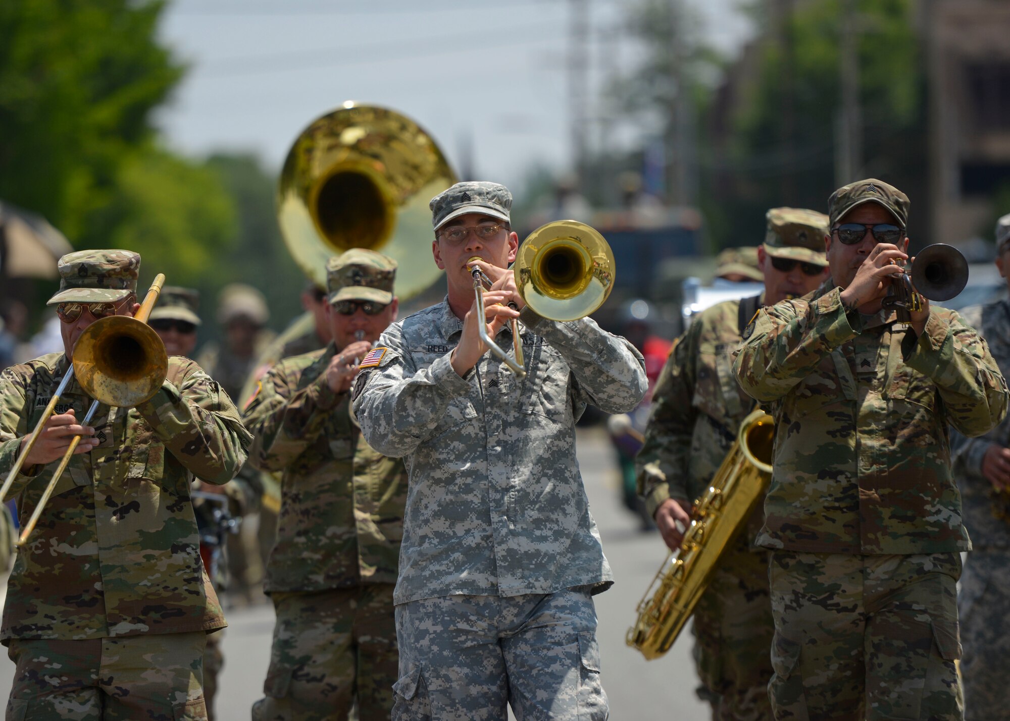 Soldiers assigned to the 8th Army Band participate in the Armed Forces Day Parade at Osan Air Base, Republic of Korea, May 21, 2016. The Veterans of Foreign Wars, Post 10216 in Songtan hosted the parade, which drew crowds of families and onlookers from all of Team Osan. (U.S. Air Force photo by Senior Airman Victor J. Caputo/Released)