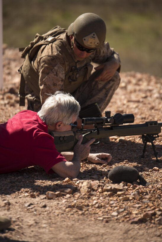 Cpl. Chance A. Benedict Jr., a mortarman, helps Ray Mabus, Secretary of the Navy, fire the M40A5 sniper rifle at Mount Bundey Training Area, Northern Territory, Australia, May 14, 2016. Mabus came to Australia to visit the Marines and Sailors of Marine Rotational Force – Darwin and observe live-fire ranges. Benedict is with 1st Battalion, 1st Marine Regiment, MRF-D.