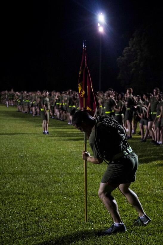 U.S. Marines with 1st Battalion, 1st Marine Regiment, prepare to run in formation on Robertson Barracks, Darwin, Australia, April 29, 2016. Running together helps Marines acclimatize to the hot and humid Australian environment during Marine Rotational Force - Darwin (MRF-D). MRF-D is a six-month deployment of Marines into Darwin, Australia, where they will conduct exercises and train with the Australian Defence Forces, strengthening the U.S.-Australia alliance.