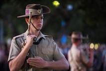 Members of the Australian Defence Forces, civilians and U.S. Marines with 1st Battalion, 1st Marine Regiment celebrate Australian New Zealand Army Corps (ANZAC) Day during a dawn service in Palmerston, Australia on April 25, 2016. Marine Rotational Force Darwin (MRF-D) is a six-month deployment of Marines into Darwin, Australia, where they will conduct exercises and train with the Australian Defence Forces, strengthening the U.S.-Australia alliance.