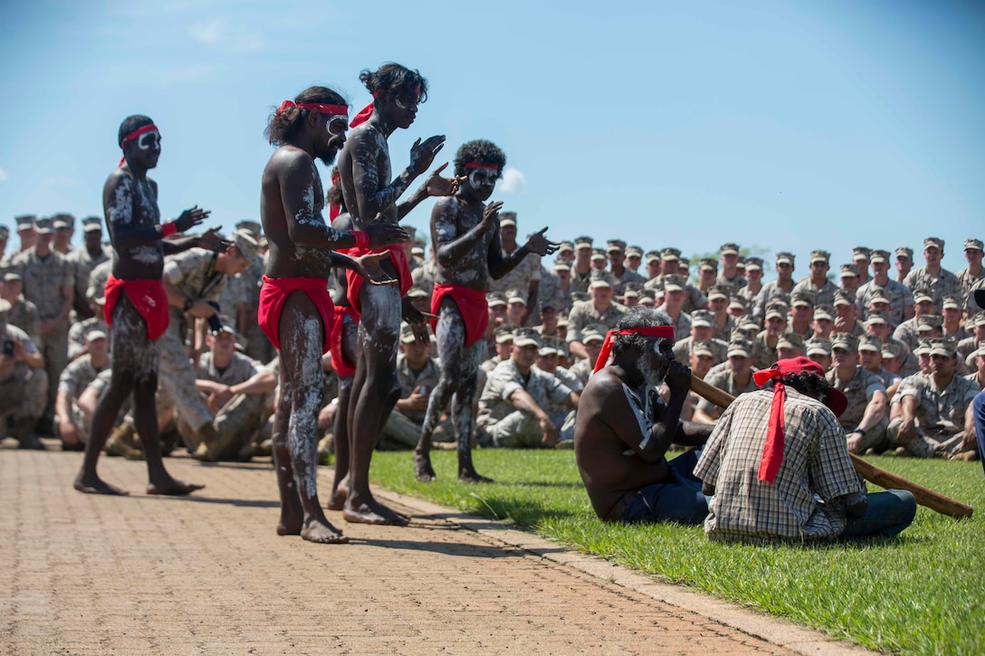 U.S. Marines with 1st Battalion, 1st Marine Regiment, watch a traditional Aboriginal dance during the Welcome to Country Ceremony on Robertson Barracks, Darwin, Australia on April 22, 2016. Marine Rotational Force Darwin (MRF-D) is a six-month deployment of Marines into Darwin, Australia, where they will conduct exercises and train with the Australian Defence Forces, strengthening the U.S.-Australia alliance.