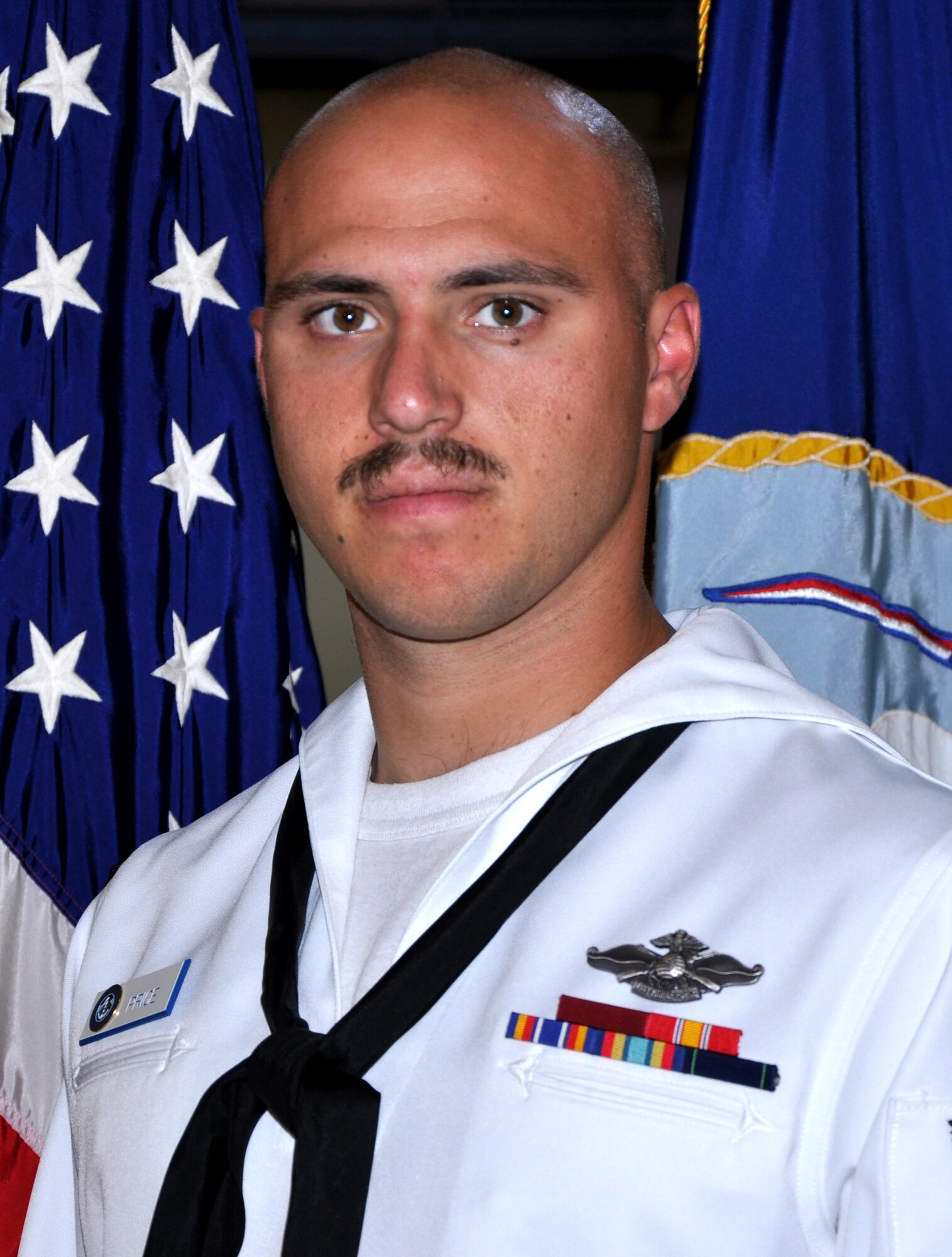 Navy Petty Officer 2nd Class Kyle Price, a hospital corpsman serving at Naval Health Clinic Charleston, located at Joint Base Charleston - Weapons Station, S.C., is lauded as a Good Samaritan for rendering aide to a man injured in a bike accident. (Navy photo by Kris Patterson)