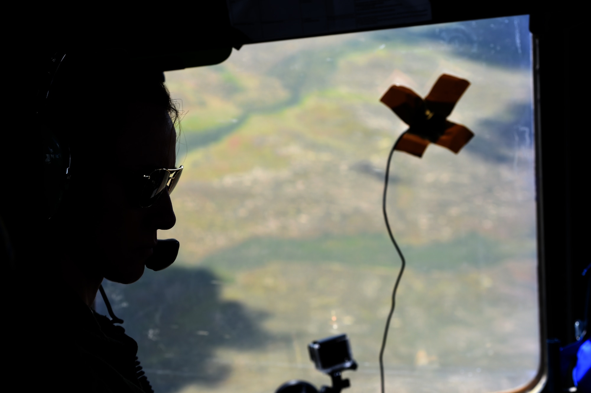 A McChord C-17 Globemaster III pilot prepares for training during a flight to the Mountain Home Range Complex, Idaho, May 17, 2016. The pilot was part of seven air crews training for Air Mobility Command’s exercise Mobility Guardian. (U.S. Air Force photo/Staff Sgt. Naomi Shipley)