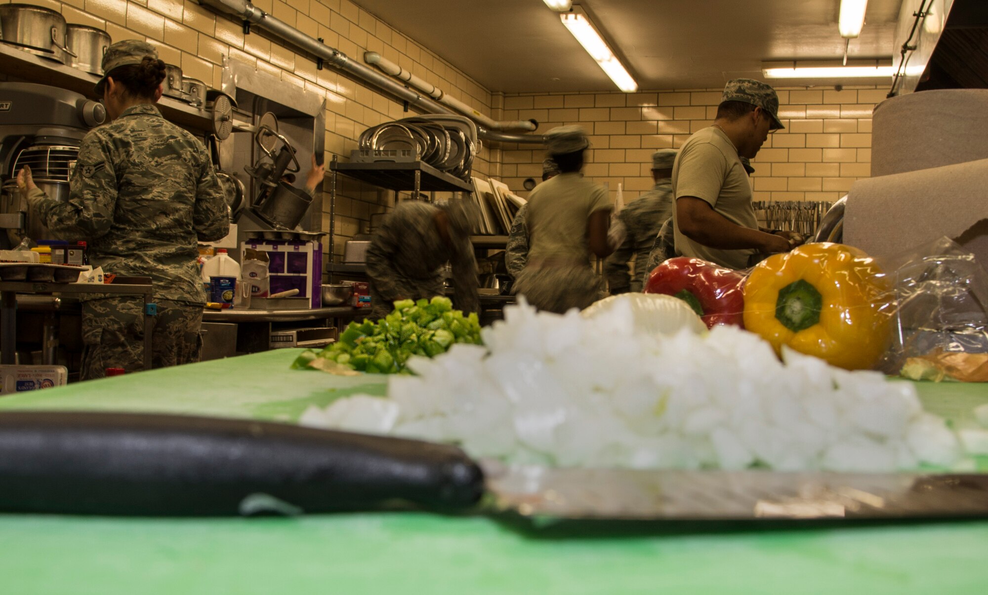 Airmen race the clock as they prepare their dishes for the top chef competition at Minot Air Force Base, N.D., May 17, 2016. Each team had to make an appetizer, main course and dessert with each containing a secret ingredient in two hours. (U.S. Air Force photo/Airman 1st Class Christian Sullivan)