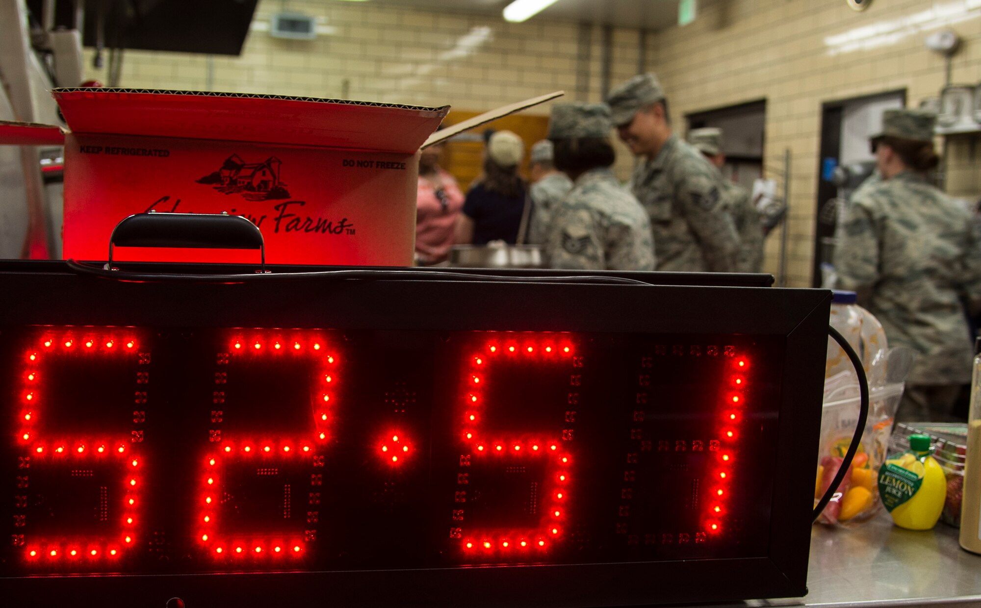 The clock ticks down as Minot chefs prepare their dishes for the top chef competition at Minot Air Force Base, N.D., May 17, 2016. Each team had to make an appetizer, main course and dessert with each containing a secret ingredient in two hours. (U.S. Air Force photo/Airman 1st Class Christian Sullivan)