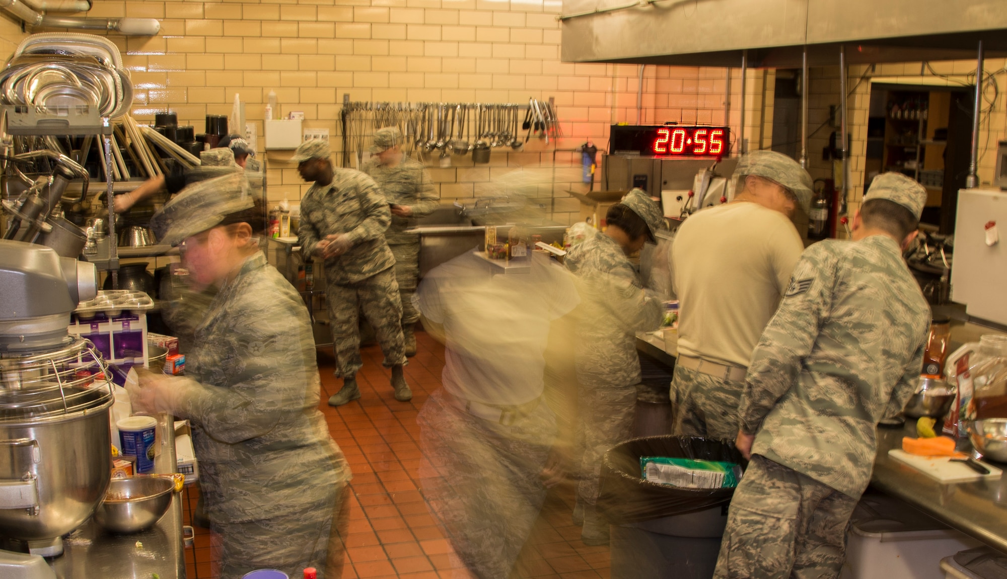 The clock ticks down as Minot chefs prepare their dishes for the top chef competition at Minot Air Force Base, N.D., May 17, 2016. Each team had to make an appetizer, main course and dessert with each containing a secret ingredient in two hours. (U.S. Air Force photo/Airman 1st Class Christian Sullivan)