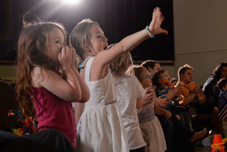 Approximately 150 family members from Minot Air Force Base, N.D., met in the base theater May 18, 2016 for the Experience for Military Families tour sponsored by the USO and Sesame Street. In honor of Military Appreciation Month and the 75th anniversary of the USO, this six-month stateside tour kicked off here debuting a new show about transitioning from military life to civilian life. (U.S. Air Force photo/Airman 1st Class Jessica Weissman)