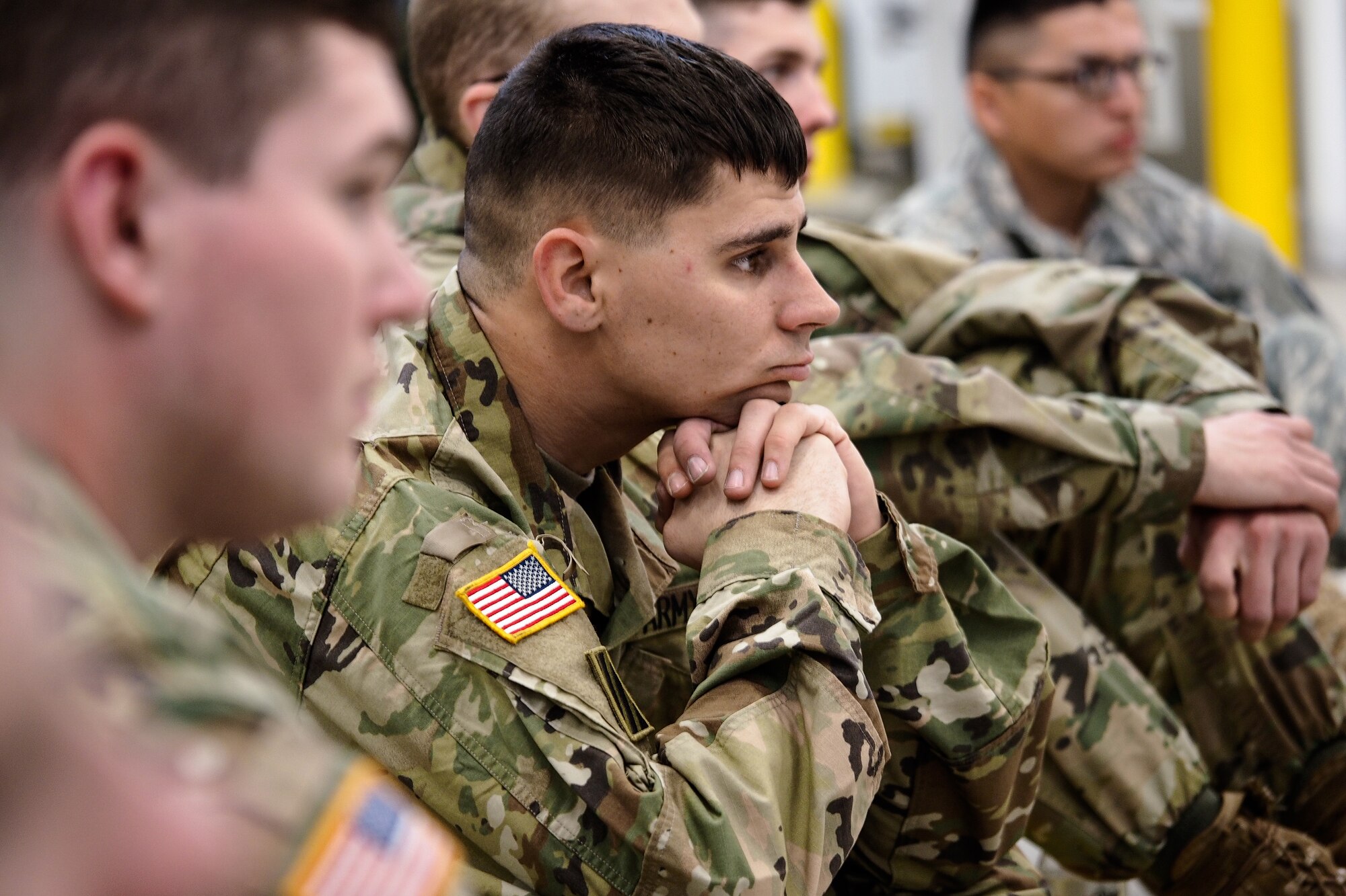 Army Sgt. Andrew Gerhardt, a native of Lake City, Fla., assigned to the 17th Combat Sustainment Support Battalion, U.S. Army Alaska, listens to a briefing on healthy eating habits during a unit Safety Stand-Down Day, Friday, May 13, 2016. The Soldiers were trained at different stations in fire prevention, personal weapons safety, outdoor recreation safety, family and personal health, and Driving Under the Influence prevention. (U.S. Air Force photo by Justin Connaher)