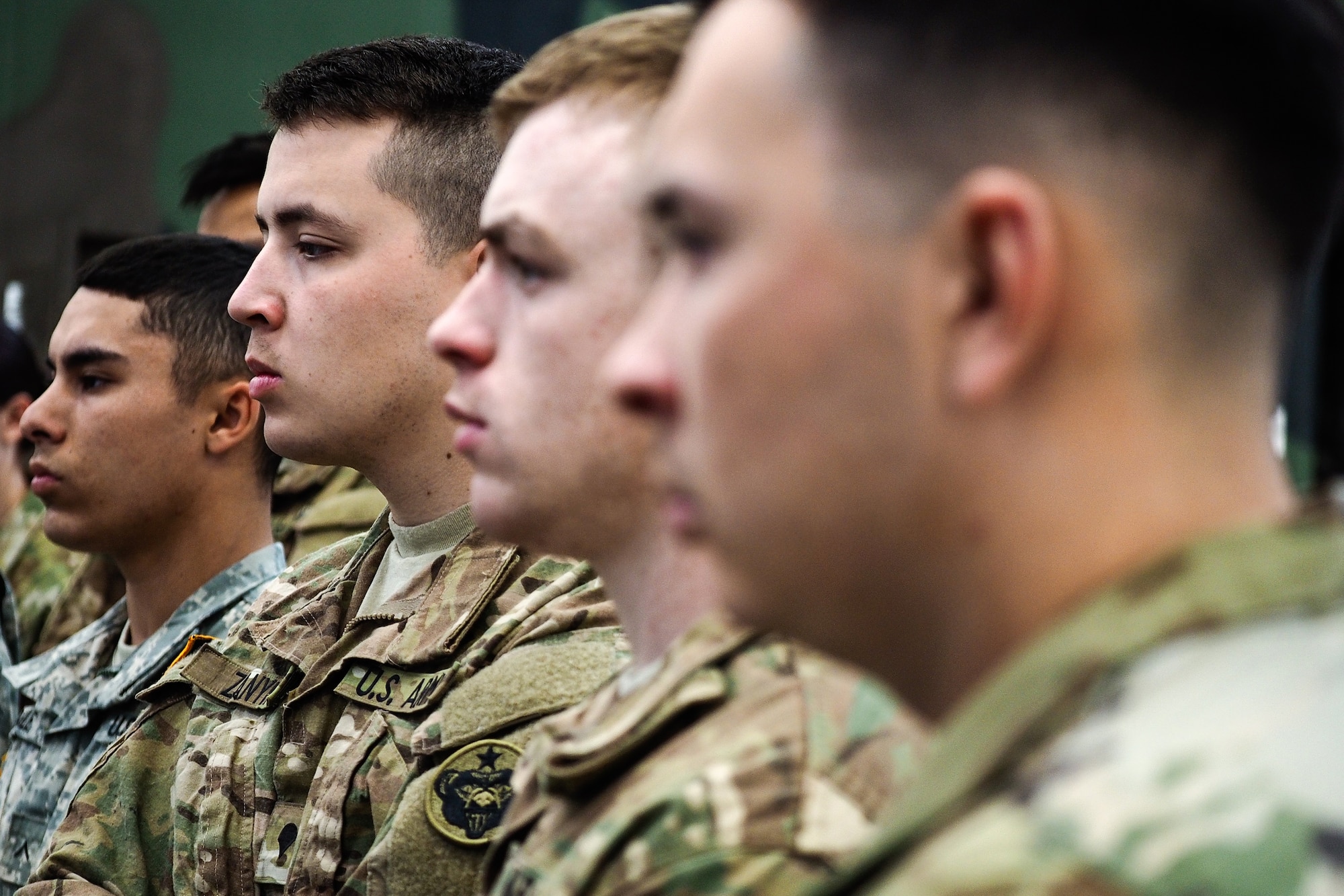Spc. Graydon Zanyk, assigned to the 17th Combat Sustainment Support Battalion, U.S. Army Alaska, listens to a safety briefing on the use of personally owned weapons during a unit Safety Stand-Down Day, Friday, May 13, 2016. The Soldiers were trained at different stations in fire prevention, personal weapons safety, outdoor recreation safety, family and personal health, and Driving Under the Influence prevention. (U.S. Air Force photo by Justin Connaher)