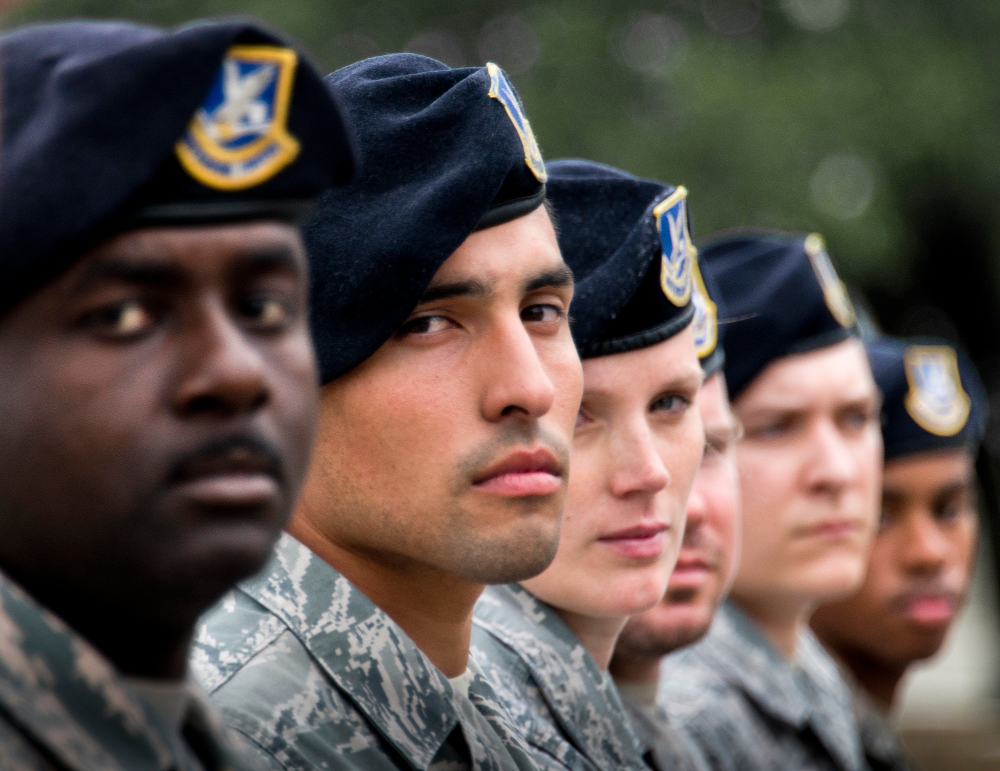 A line of 96th Security Forces Squadron Airmen face right during a flight formation adjustment prior to a retreat ceremony May 20 at Eglin Air Force Base, Fla.  The security forces-lead ceremony wrapped up the squadron’s National Police Week activities.  (U.S. Air Force photo/Samuel King Jr.)