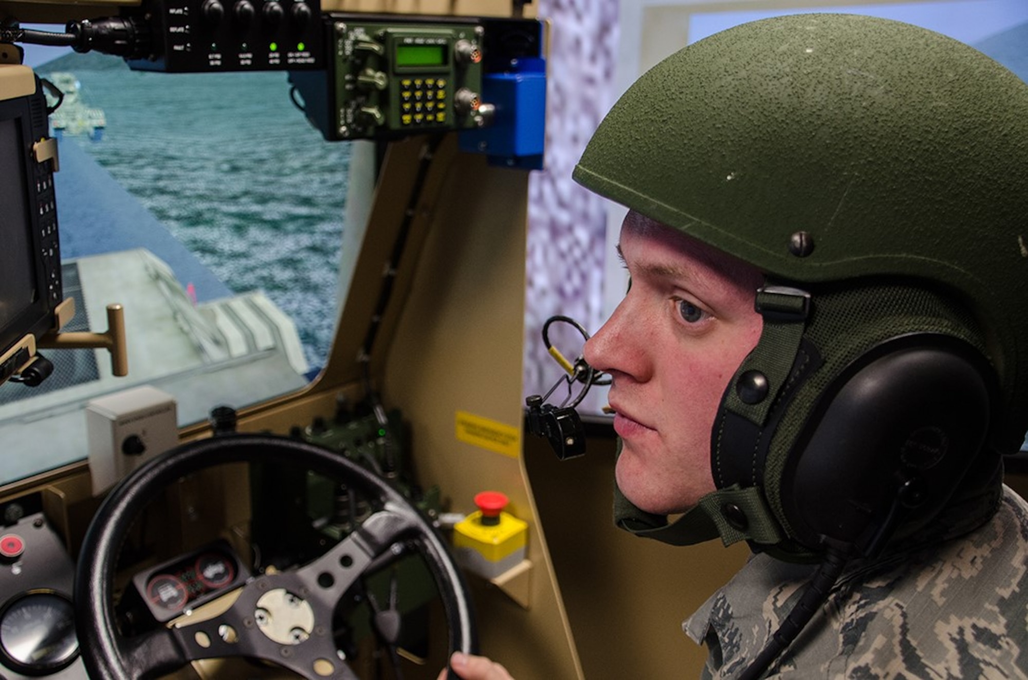 Senior Airman Logan Decker, a 131st Bomb Wing avionics technician, drives the vehicle-mounted mine detector as part of a virtual-reality training simulation during Annual Training at Camp Clark, Missouri, on May 18, 2016. The dashboard of the VMMD is nearly an exact replica of what Airmen would experience in the field. 