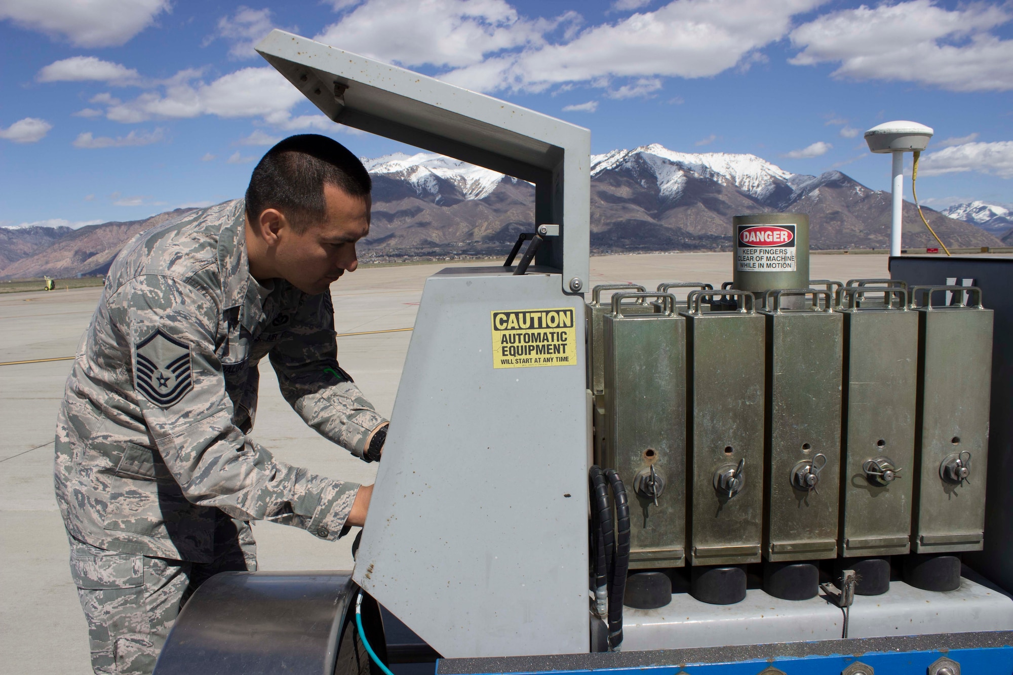 Master Sgt. Robinson Hidalgo, superintendent of the Air Force Civil Engineer Center Airfield Pavement Evaluation, or APE, Team, prepares the heavy weight deflectometer to test airfield pavement at Hill AFB, Utah.