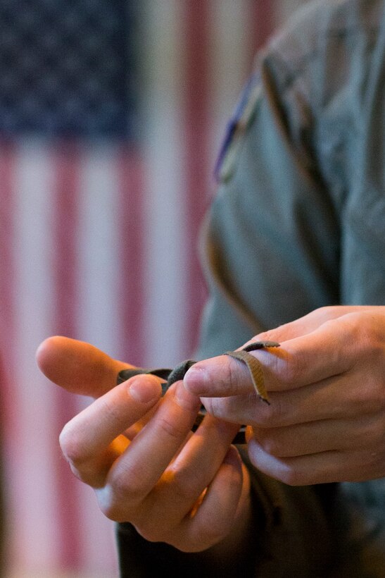 Staff Sgt. Joel Powell, 374th Operations Support Squadron joint airdrop inspector, demonstrates rope work during joint airdrop inspection familiarization for Japan Air Self-Defense Force loadmasters with the 401st Squadron at Yokota Air Base, Japan, May 18. Members with the JASDF familiarized with JAI procedures to prepare for heavy equipment and high-velocity container delivery systems during the upcoming Red-Flag Alaska. (U.S. Air Force photo by Yasuo Osakabe/Released)