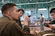 U.S. Air Force Staff Sgt. Joel Powell, 374th Operations Support Squadron joint airdrop inspector, shares his experiences during a joint airdrop inspection to Japan Air Self-Defense Force loadmasters from the 401st Squadron at Yokota Air Base, Japan, May 18, 2016. Members of JASDF familiarized with JAI procedures to prepare themselves to drop USAF’s heavy equipment and high-velocity container delivery systems during exercise Red-Flag Alaska. (U.S. Air Force photo by Yasuo Osakabe/Released)