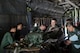 U.S. Air Force Staff Sgt. Joel Powell, 374th Operations Support Squadron joint airdrop inspector, demonstrates joint airdrop cargo inspection procedures to Japan Air Self-Defense Force members after loading heavy equipment onto a USAF C-130H Hercules at Yokota Air Base, Japan, May 18, 2016. Members of JASDF familiarized with JAI procedures in preparation to drop USAF’s heavy equipment and high-velocity container delivery systems during exercise Red-Flag Alaska. (U.S. Air Force photo by Yasuo Osakabe/Released)