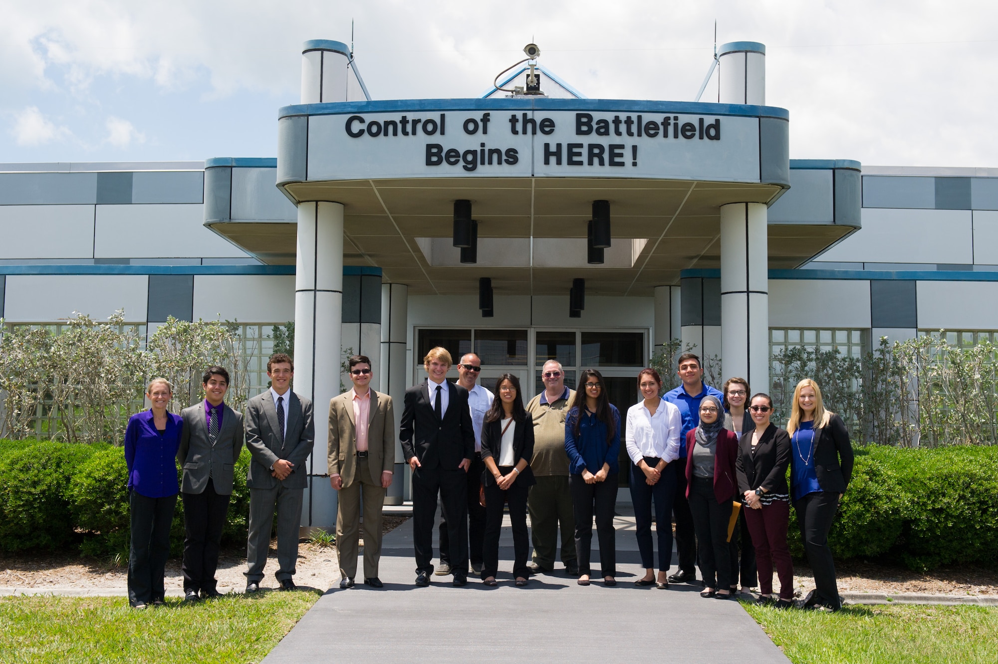 Members of the 45th Space Wing Weather Squadron met with Lake Nona High School students at Cape Canaveral Air Force Station, Fla. May 23, 2016, to discuss their Lightning Launch Commit Criteria (LLCC) findings and results in regards to weather and climatology. Prior to the school year, Bill Roeder, 45th Space Wing Weather Squadron meteorologist, reached out to the high school and introduced them to the project. The project provides students with real-world experience by following a business model of preparation, set-up, and using innovative methods to complete it. During the visit, the students also met with leadership and toured the Morrell Operations Center. (U.S. Air Force photos/Benjamin Thacker/Released) 