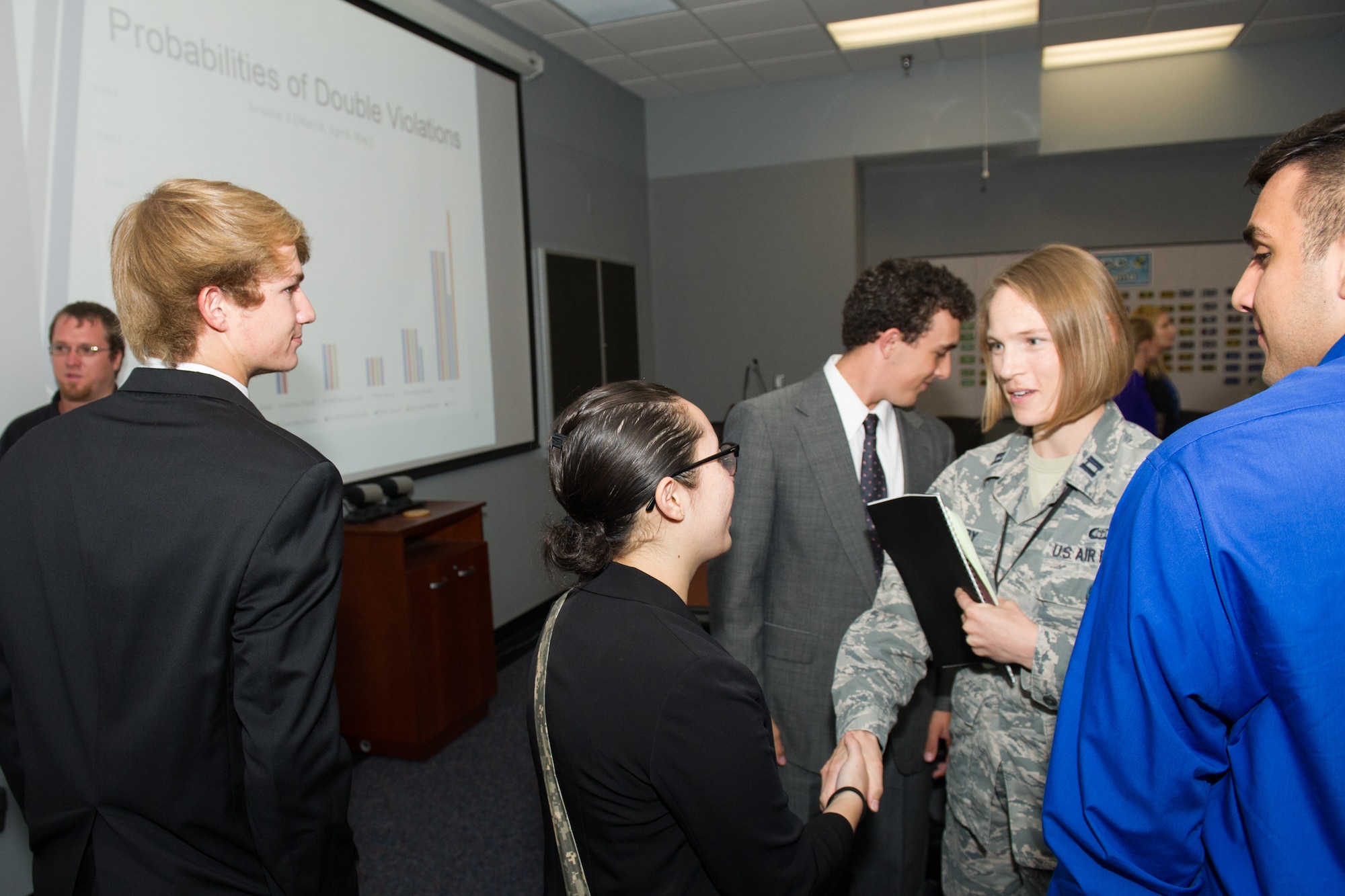 Members of the 45th Space Wing Weather Squadron met with Lake Nona High School students at Cape Canaveral Air Force Station, Fla. May 23, 2016, to discuss their Lightning Launch Commit Criteria (LLCC) findings and results in regards to weather and climatology. Prior to the school year, Bill Roeder, 45th Space Wing Weather Squadron meteorologist, reached out to the high school and introduced them to the project. The project provides students with real-world experience by following a business model of preparation, set-up, and using innovative methods to complete it. During the visit, the students also met with leadership and toured the Morrell Operations Center. (U.S. Air Force photos/Benjamin Thacker/Released) 