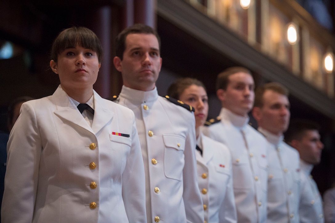 Navy ROTC midshipmen stand at attention as Defense Secretary Ash Carter delivers remarks during a commissioning ceremony at Yale University in New Haven, Conn., May 23, 2016. DoD photo by Air Force Senior Master Sgt. Adrian Cadiz 

