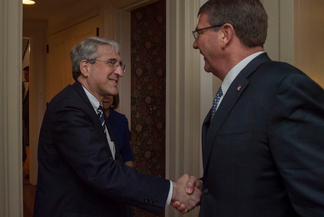 Defense Secretary Ash Carter shakes hands with Yale University President Peter Salovey as he arrives to deliver remarks at the ROTC commissioning ceremony at the university in New Haven, Conn., May 23, 2016. DoD photo by Air Force Senior Master Sgt. Adrian Cadiz