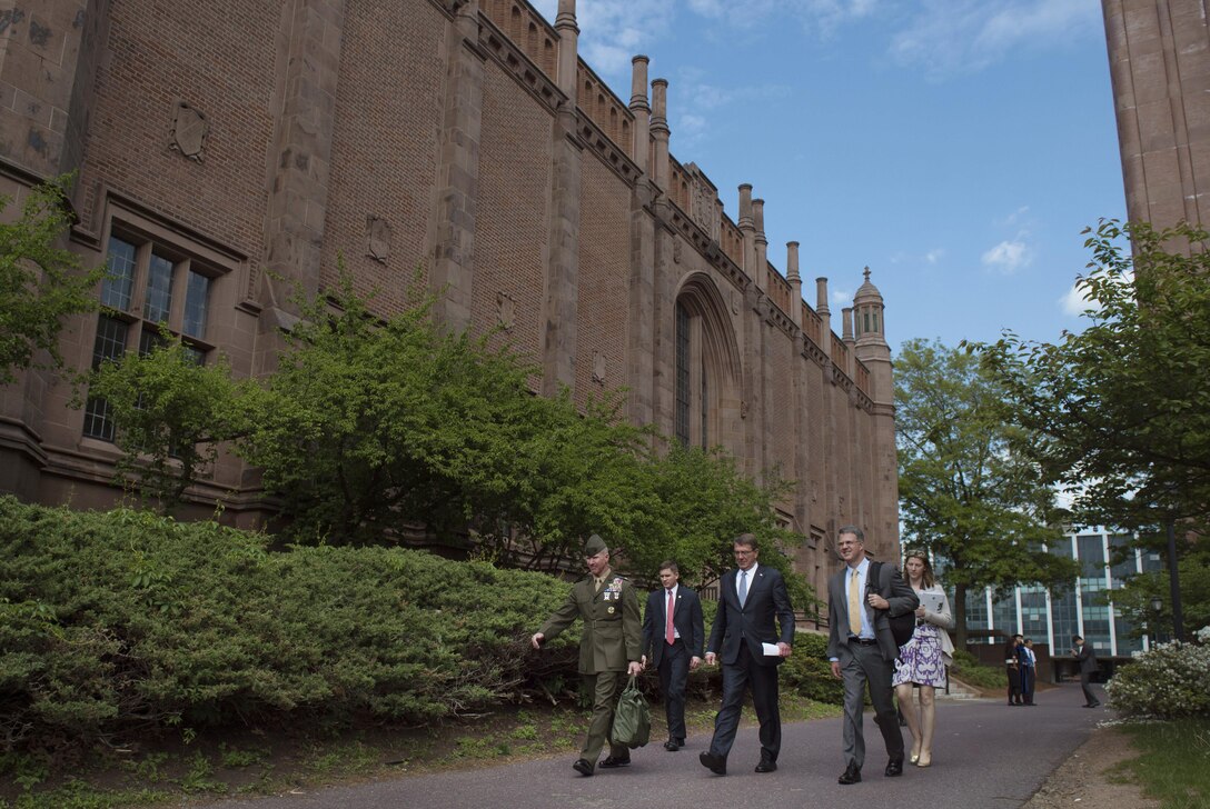 Defense Secretary Ash Carter, second from right, walks through the Yale University campus in New Haven, Conn., May 23, 2016, as he arrives to deliver remarks at the ROTC commissioning ceremony. DoD photo by Air Force Senior Master Sgt. Adrian Cadiz