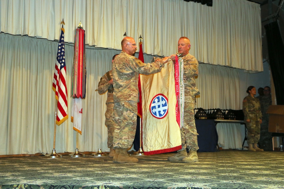 U.S. Army Reserve Brig. Gen. Kenneth D. Jones, left, commander of the 4th Sustainment Command (Expeditionary), and Command Sgt. Maj. Paul C. Swanson, the senior enlisted adviser for the unit, uncased the colors during a Welcome Home Warrior Citizen Award Program Recognition Ceremony May 7 at Fort Hood, Texas. The ceremony formally marks the unit’s completion of their mission under the 1st Theater Sustainment Command and their transition back to their home stations.