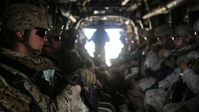 Marines with the 11th Marine Expeditionary Unit fly to their objective in an MV-22B Osprey with Marine Medium Tiltrotor Squadron 163 (Reinforced) on Marine Corps Base Camp Pendleton, Calif., May 17. Marines with VMM-163 (Rein.) supplied four MV-22B Ospreys, two AH-1W Cobras, two UH-1Y Hueys and one CH-53E Super Stallion to support a simulated raid. 