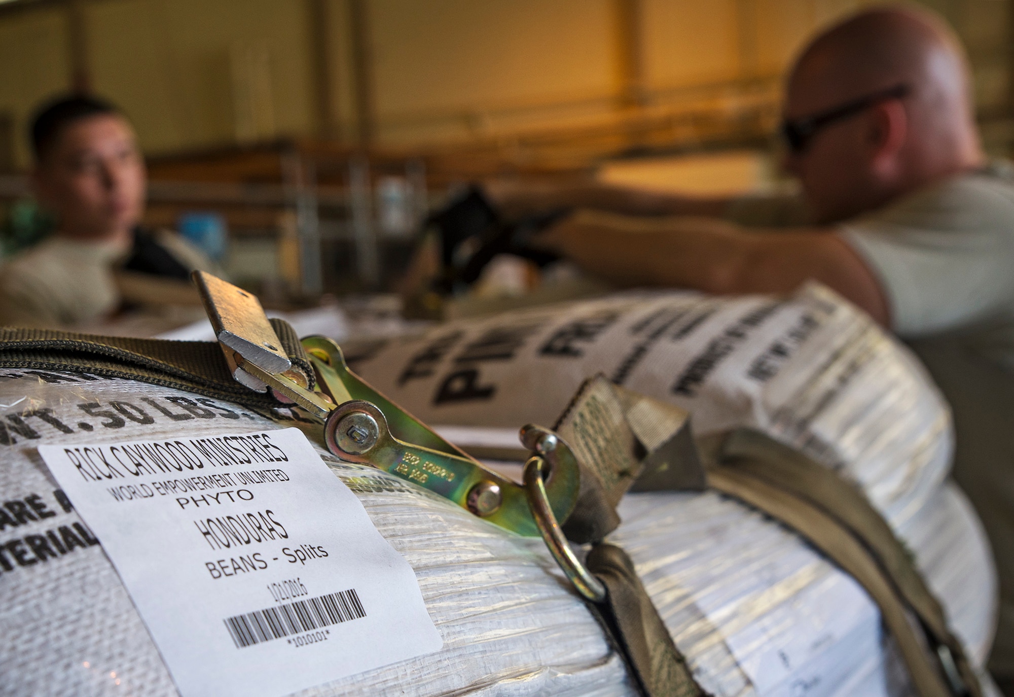 The 433rd Airlift Wing transported pallets of rice and beans to Yoro, Honduras, on a C-5M Super Galaxy aircraft May 13, 2016 from Joint Base San Antonio-Lackland, Texas. The 433rd Airlift Wing and 502nd Logistics Readiness Squadron worked together to ensure 90,000 pounds of food aid made it to the Central American country. (U.S. Air Force photo by Benjamin Faske) (released)