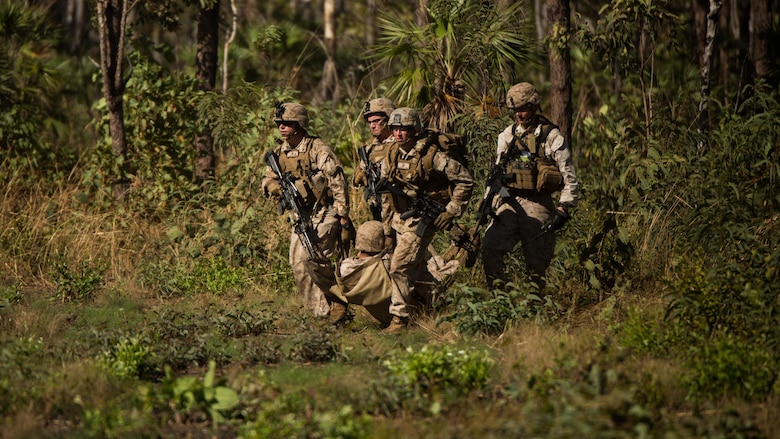 U.S. Marines move a simulated casualty onto a landing zone outside of Robertson Barracks, Northern Territory, Australia, May 20, 2016. Marines with Marine Rotational Force - Darwin simulated causality evacuations with a UH-1Y Venom helicopter.