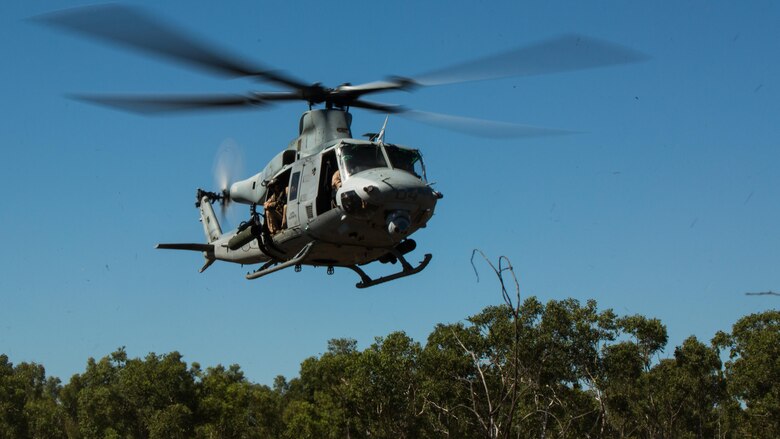 A UH-1Y Venom helicopter hovers above a landing zone outside of Robertson Barracks, Northern Territory, Australia, on May 20, 2016. Marines with Marine Rotational Force - Darwin simulated causality evacuations with a UH-1Y Venom helicopter. MRF-D is a six-month deployment of Marines into Darwin, Australia, training in a new environment. The Marines are with Marine Light Attack Helicopter Squadron 367, MRF-D.