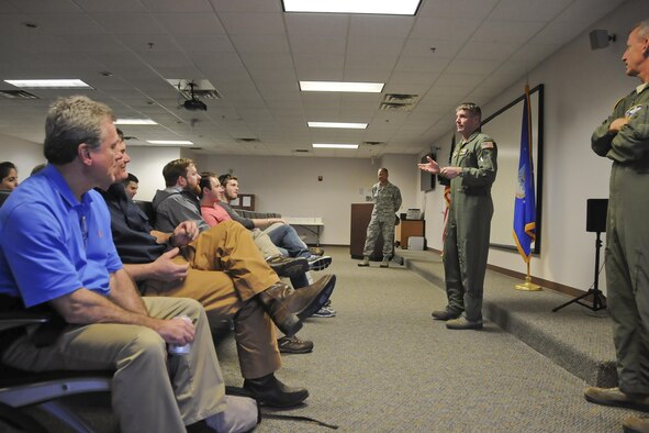 Colonel David A. Owens, 459th Air Refueling Wing commander, gives a briefing about the 459th’s mission and the Reserve’s contribution to total force to a group of congressional representatives and staffers at Moody Air Force Base, Ga., May 20. The 459th flew the congressional delegation from Moody, where they witnessed an air power demonstration, back to the National Capital Region. During the flight, the distinguished travelers witness the refueling of a 1st Fighter Wing F-22 Raptor. (U.S. Air Force photo/Staff Sgt. Kat Justen)